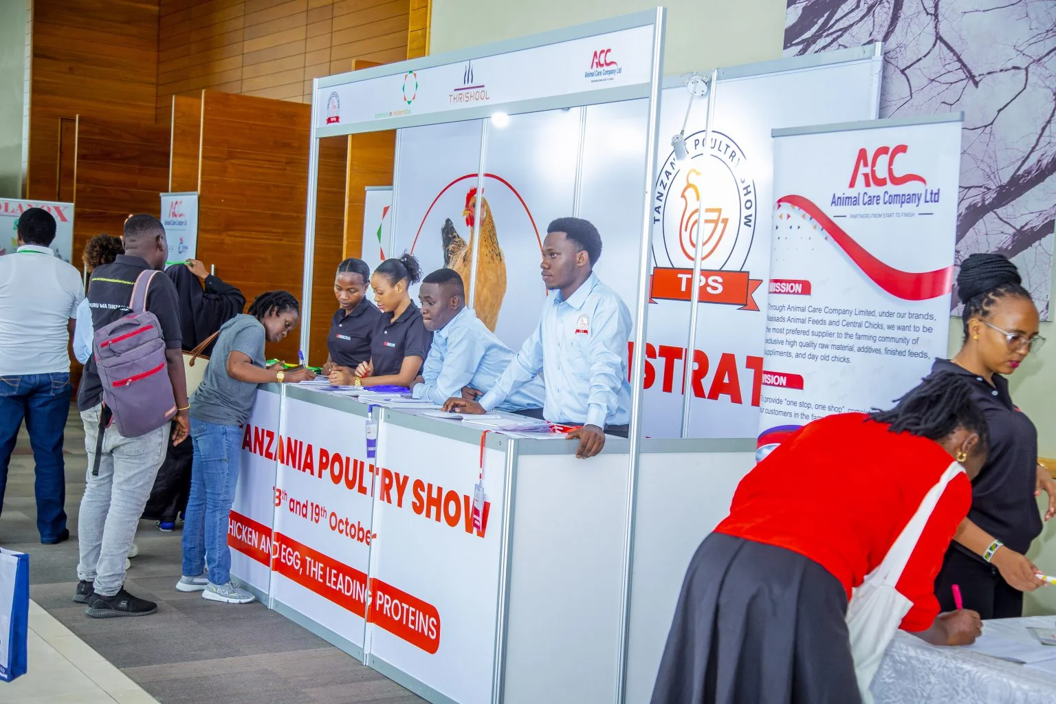 Visitors signing in at the Tanzania Poultry Show registration desk
